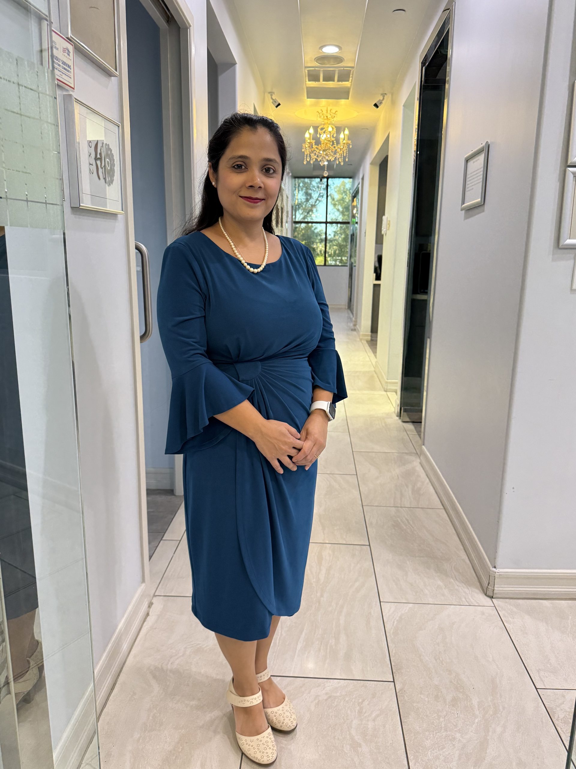 Dr. Surabhi Gajendragadkar, known for her gentle approach and personalized care, welcoming patients to Smile Craft Dental Group – Laguna Hills dentist.