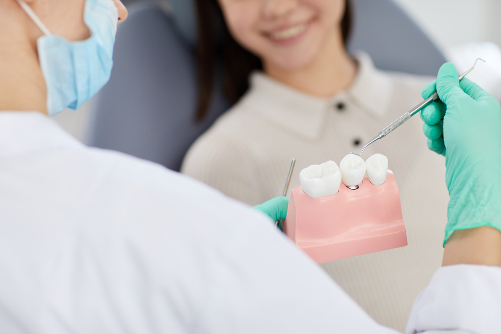 Bright Smile in Dental Chair - Porcelain Veneers Orange County A patient enjoys a comfortable visit while achieving a whiter, straighter smile with veneer care - Porcelain Veneers Orange County